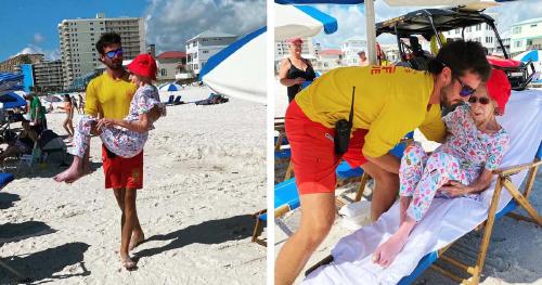 lifeguards carry woman to beach thumbnail