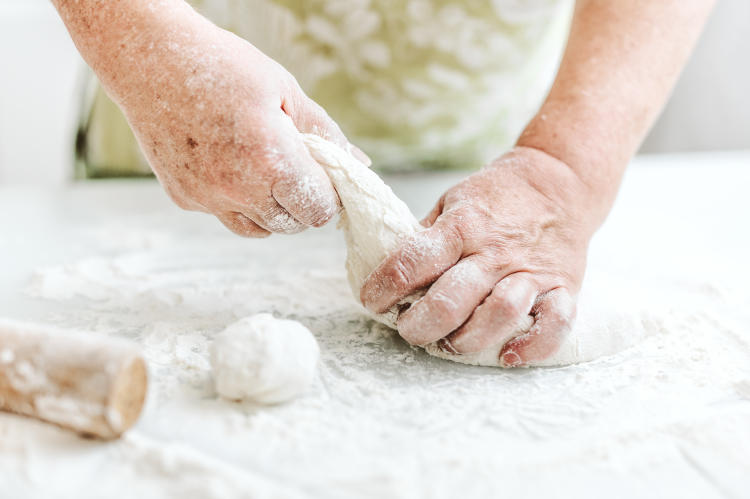 woman-at-home-kneading-dough-for-cooking-pasta-pizza-or-bread-home-cooking-concept-lifestyle woman-at-home-kneading-dough-for-cooking-pasta-pizza-or-bread-home-cooking-concept-lifestyle