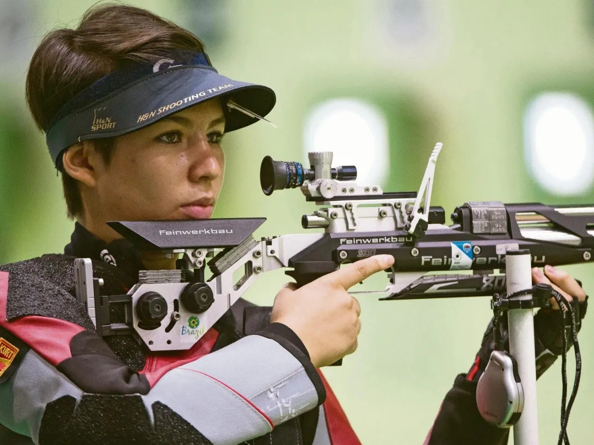 mujeres deportes tiro