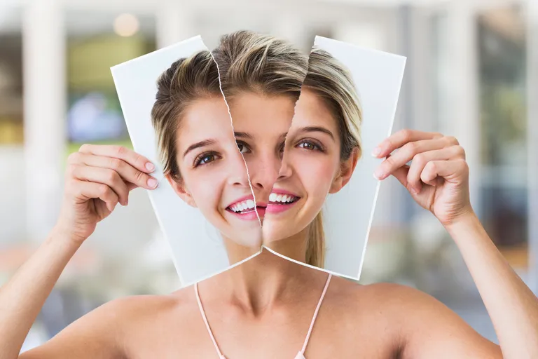 young woman tearing portrait of face in half royalty free image 1641305584.jpg young woman tearing portrait of face in half royalty free image 1641305584.jpg