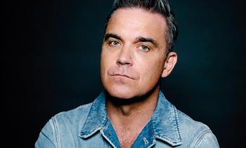 PR Robbie Williams min