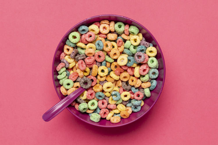 delicious and nutritious fruit cereal loops flat lay